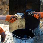 Bitumen coating on concrete