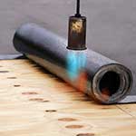 Bitumen coating on wood